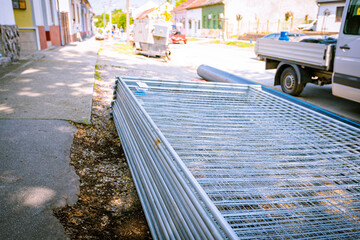 Stack of metal wire fence at the construction site