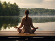 frau unerkannt generative ki fiktkiv meditiert und geniesst ausblick auf einen see yoga