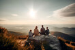 A family sits on a stone high in the mountains and looks into the distance. Mom, dad, children. Family concept, family values. Family recreation in nature.
