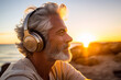 A portrait of a happy retired male elder, wearing sunglasses and modern headphones, is listening to a music song at sunrise morning time. Generative AI.