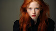 © Alex - Close-up portrait of a beautiful young woman with red hair.