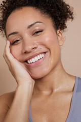 Canvas Print - Close-up of smiling athletic woman with sweat of face