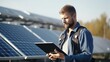 Engineer with tablet to inspect and maintain solar panels solar energy digital technology