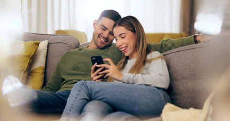 Wall Mural - Relax, phone and couple on sofa for social media, internet and reading funny website together. Dating, home and man and woman on smartphone laugh for meme and bonding, happy and love in living room