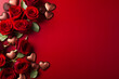 Frame of red roses and chocolates, with plain red background and copy space