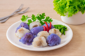 Wall Mural - Steamed rice skin dumplings with vegetable, Thai dessert style