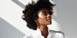 © RemsH - portrait of an afro woman on a white background, make-up, cosmetics, beauty, fashion