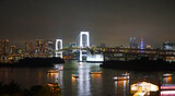 Fototapeta  - Rainbow Bridge and Tokyo Bay at Night. Odaiba, Japan.