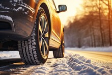 Close-Up of Car Tires on Snowy Path