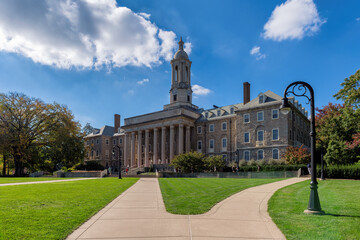 The Old Main building on the campus of  Pennsylvania State University in summer sunny day, State College, Pennsylvania.