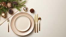  A Place Setting With A White Plate, Silverware, Pine Cones, And A Gold Christmas Ornament.  Generative Ai