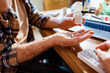 © Marko Geber - Close up senior man organizing medication at home