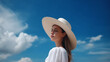 ©  iiulia - A woman in a white dress and hat. AI Generated