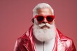 © Fotograf - A picture of a man with a white beard wearing red sunglasses. This image can be used for various purposes, such as advertising, fashion, or holiday-themed designs