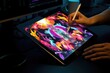 The hands of an artist holding a digital drawing tablet and stylus, creating a vibrant digital masterpiece.