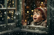 Winter wonderland: A child looks out a window the snow fall, filled with wonder and joy. Celebrating the Christmas season with excitement.