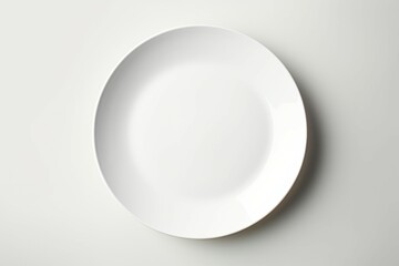 White plate placed on a white background