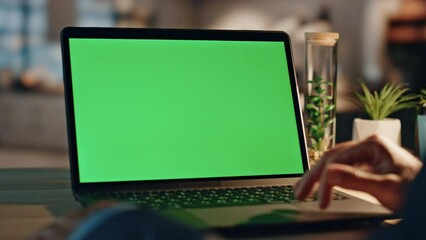 Man hands swiping greenscreen laptop touchpad at office closeup. Manager working