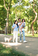 © Timeimage - Photo of young Asian family at park