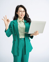 Wall Mural - Image of young Asian business woman on background