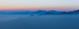 Fototapeta Łazienka - Beautiful himalayan mountain ridges in soft blue down light. Cover image format.