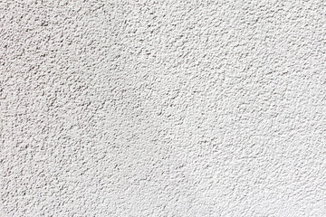 Wall Mural - White plaster on the wall of a house as an abstract background