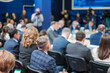 © Anton Gvozdikov - Back view of business professionals attending conference meeting in auditorium at export forum