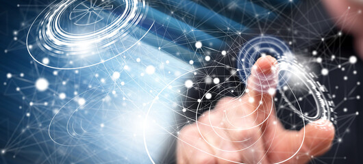 Wall Mural - Man touching a virtual technology concept