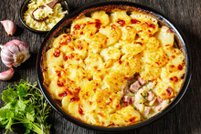 Au Gratin Potatoes With Diced Ham And Green Peas