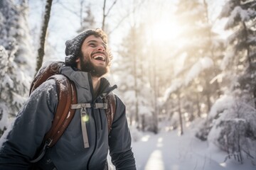 a young man hiking through a pristine winter forest, his face beaming with joy as he experiences the liberating beauty of a snowy wonderland