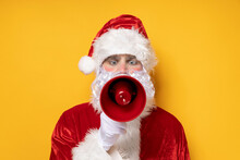 Santa Claus, With A Megaphone In His Hands.