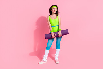 Poster - Photo of sporty lady trainer hold fitness mat look empty space on sport store sale discounts isolated pastel color background