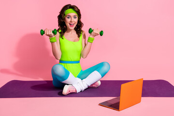 Canvas Print - Photo of funny sporty coach lady doing weight power lifting recording video on sport blog netbook isolated pastel color background