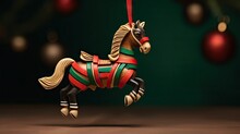  A Christmas Ornament Of A Horse With A Red, Green, Yellow, And Red Ribbon On It's Tail And A Red Ornament Hanging From A String.  Generative Ai