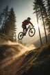 Sports, active healthy lifestyle, travel concepts. A male cyclist wearing a helmet does tricks and jumps on a bicycle in the forest mountains at sunset