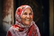 An older Arab woman smiling