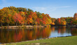 Brilliant autumn colors reflected in Coe Lake in Berea, Ohio