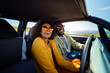 © Jasmina - Happy young couple driving a car to the countryside.. Summer vacation and travel concept