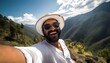 30-year-old indian man taking a selfie on a mountain