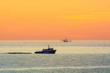 Wall Mural - fishing boats at sunrise