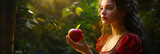 Beautiful woman with red apple, like in a fairy tale.