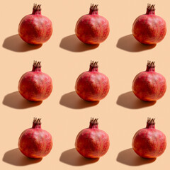 Wall Mural - Seamless pattern with pomegranate fruit for Jewish holiday Rosh Hashanah on orange background.