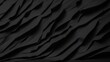 Heavy crumpled black paper texture in low light background. AI Generated