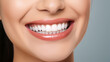 © Farid - oung beautiful woman smiling on white background. Oral hygiene concept close up. Made with generative ai