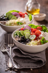 Wall Mural - Fresh Greek salad with buckwheat groats as fit food.