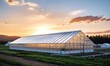 © uhdenis - A Serene Greenhouse Overlooking a Vibrant Landscape