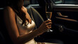 A wealthy woman with a glass of champagne in luxury car