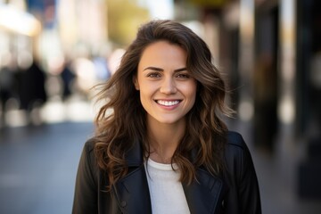 Business woman with brown hair and casual business style