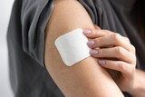Fototapeta Na sufit - Empowered Woman Using Nicotine Patch