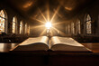 An open Bible on a table in a church in the sunlight